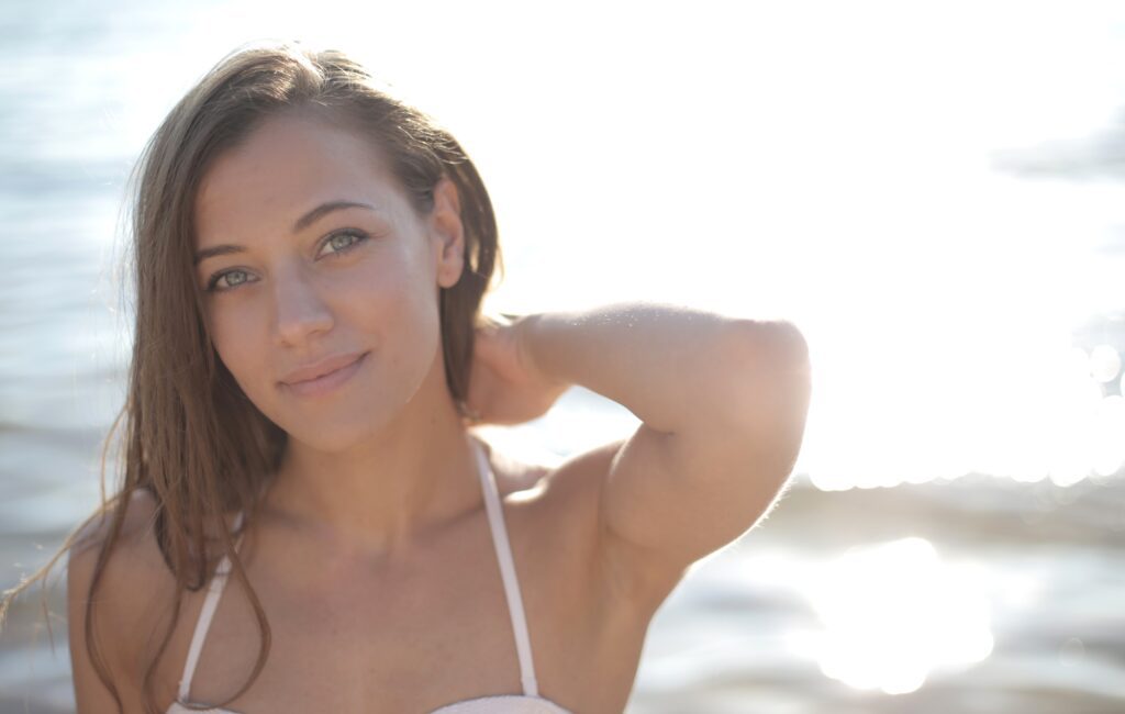 Woman near the beach experiencing Holistic Mental Wellness