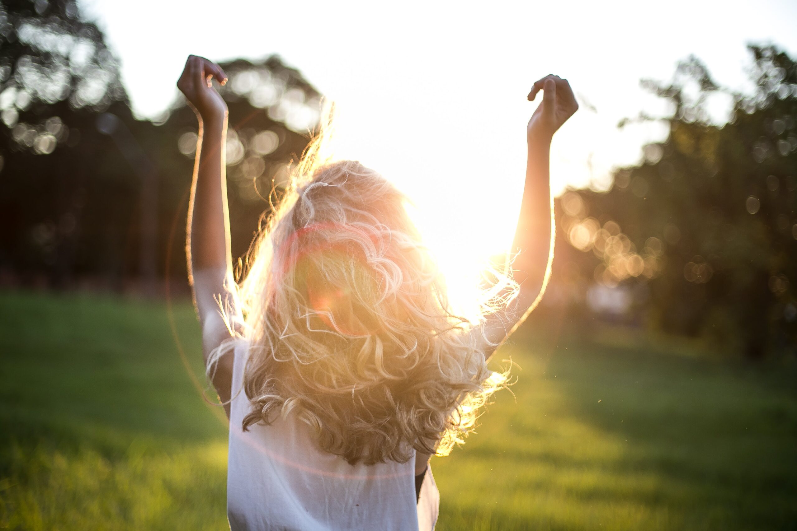 Woman in the sun taking in Vitamin D for ADHD managment