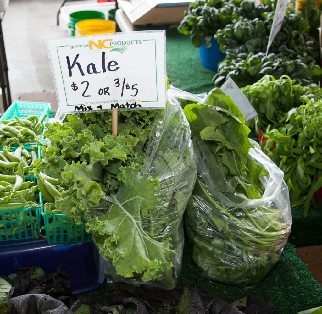 Kale at a market for Detoxifying Quinoa and Kale Salad recipe