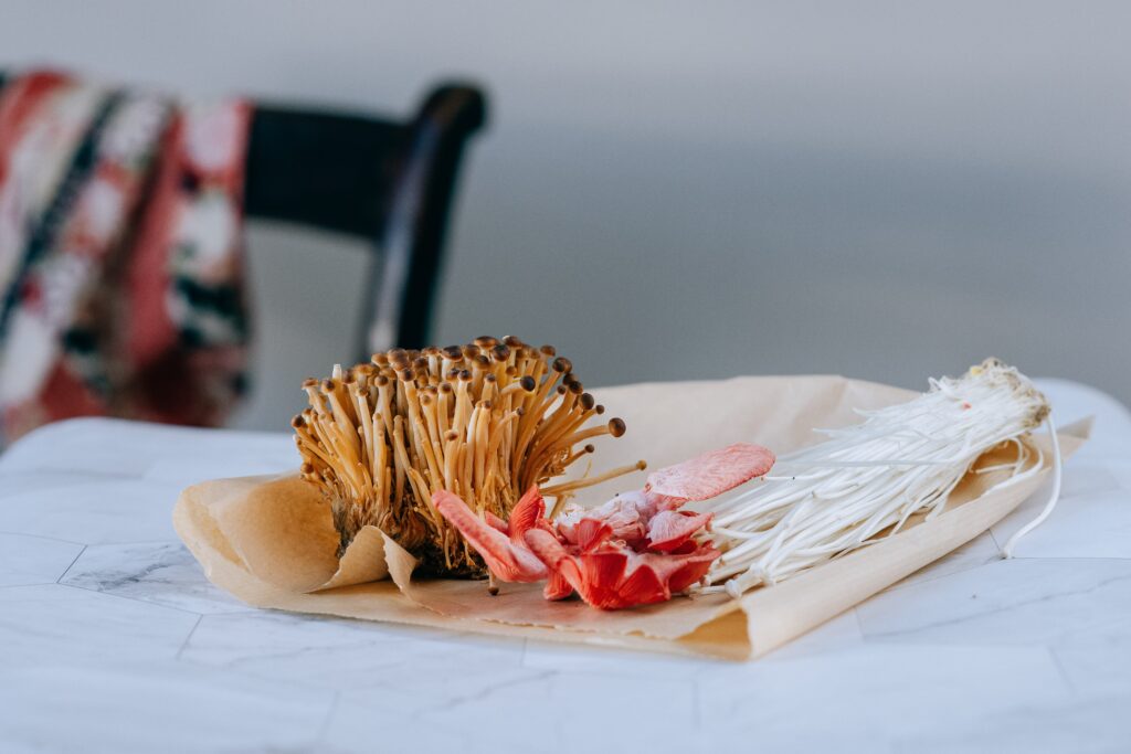 mushroons on a table for a Enoki mushroom salad