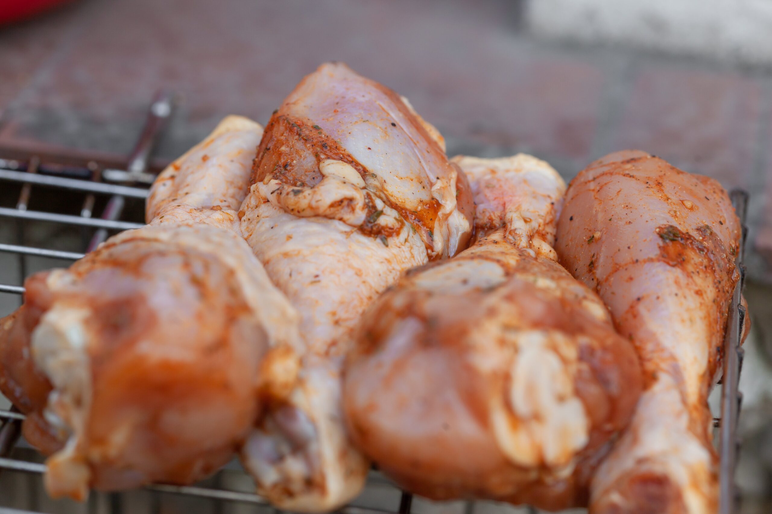 Chicken legs on grill for Saffron-Infused Chicken Tagine