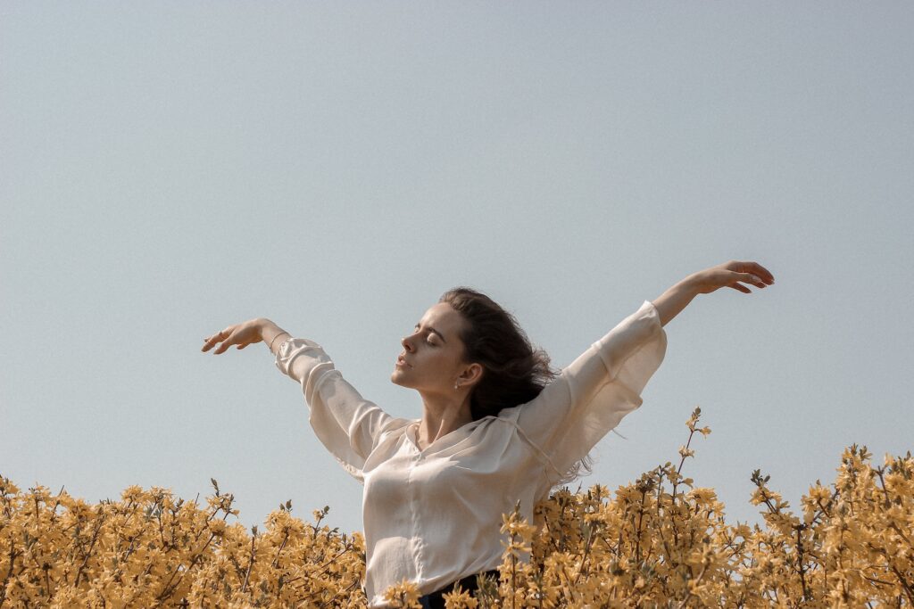 woman carefree in a field