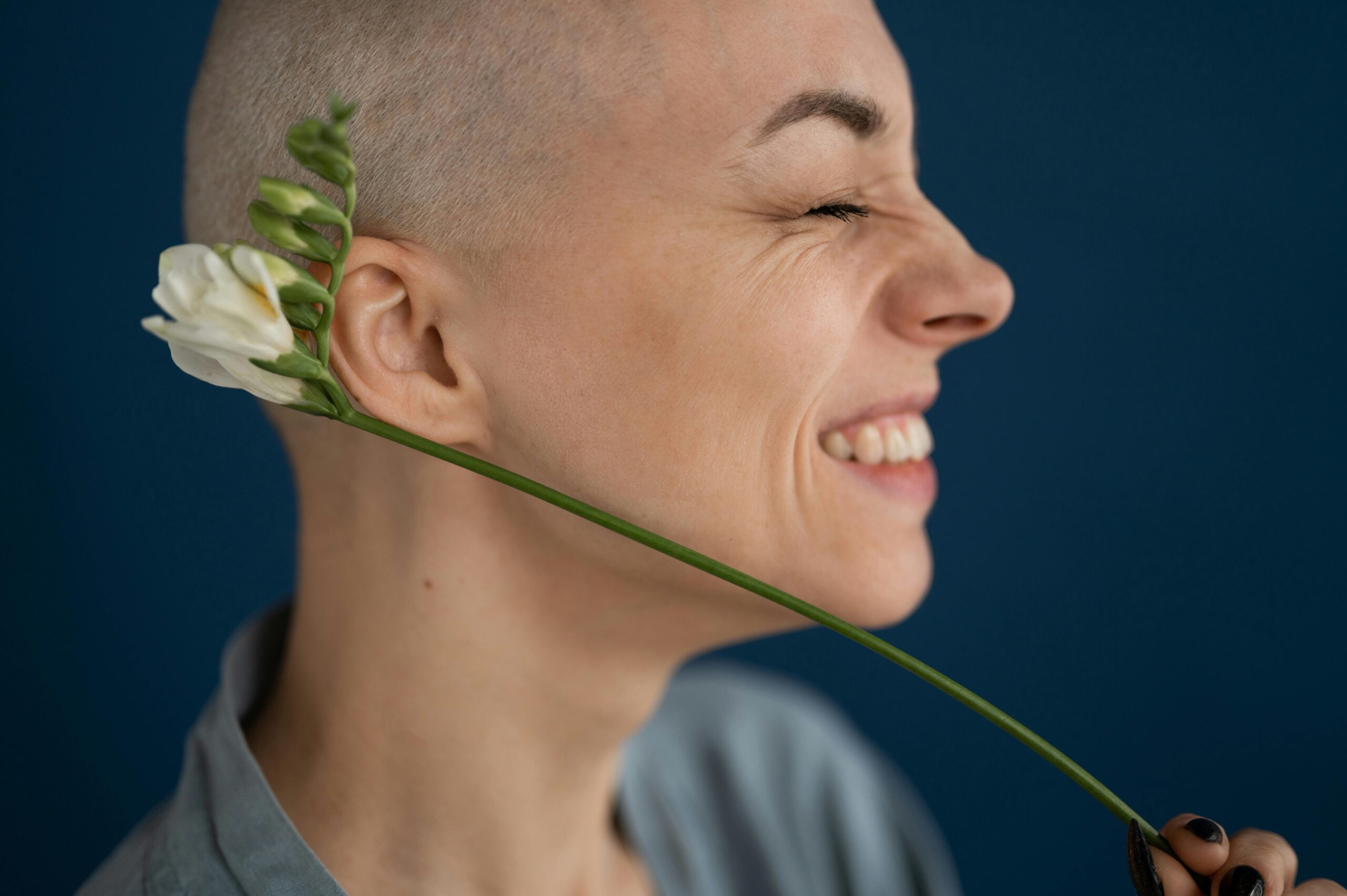 woman with a flower behind her ear for post entitled Methylation Pathways:Silent Architects