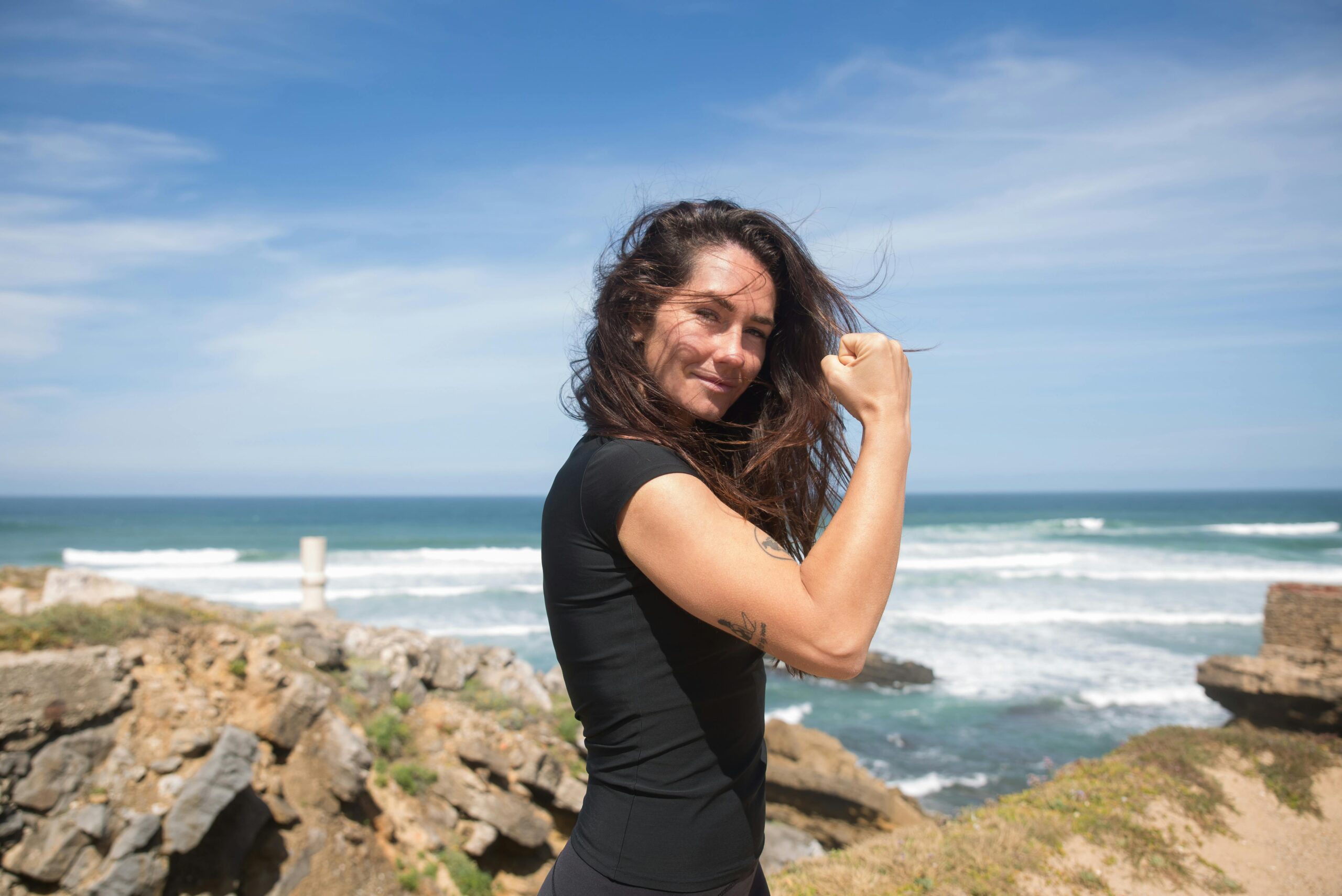 woman flexing her muscles