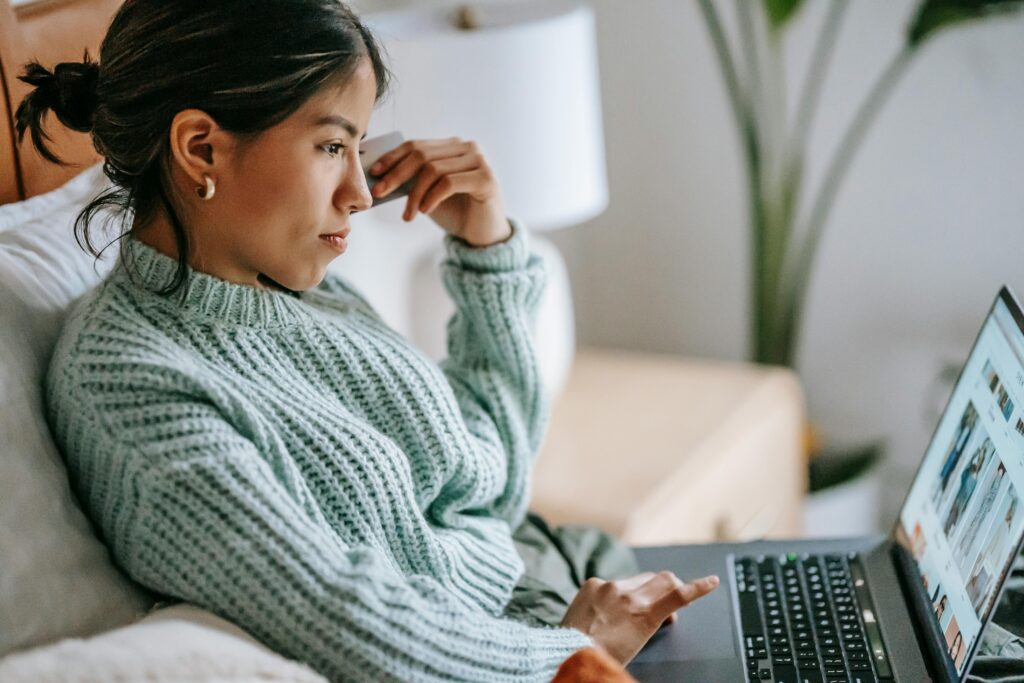 woman looking at computer for Mental Health Journey: Continue the Expedition post